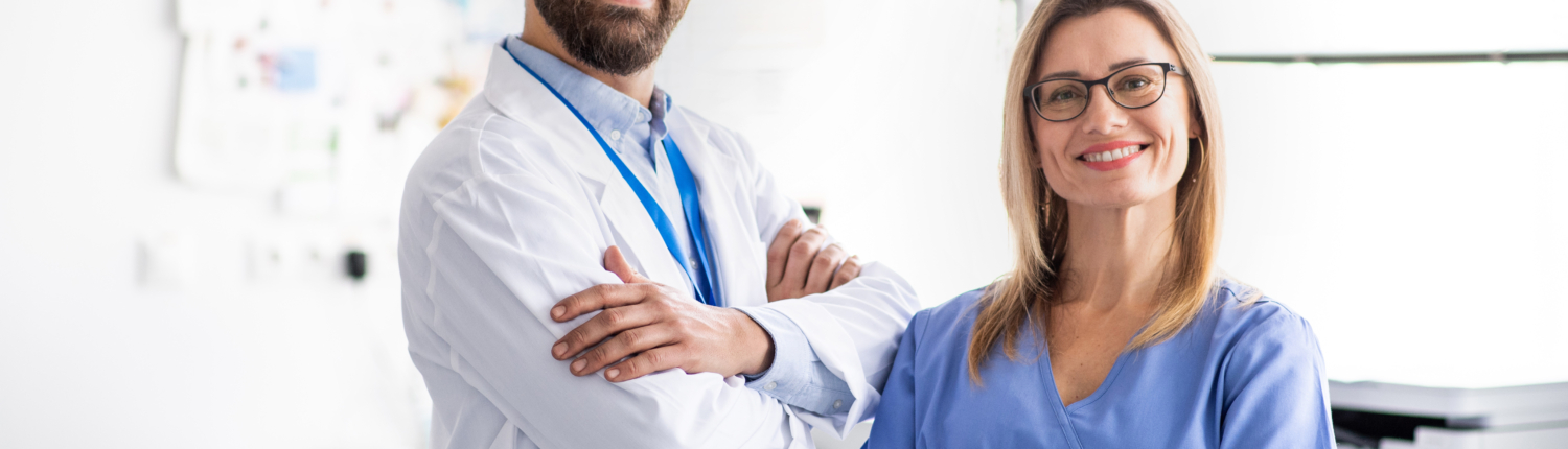 A dentist with dental assistant in modern dental surgery.